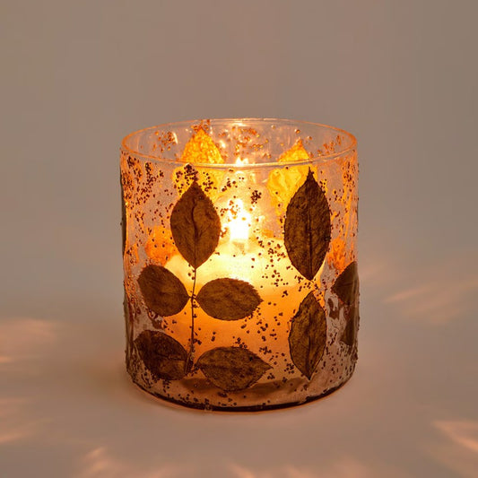 Porta velas de cristal con hojas doradas